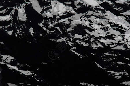 黑色透明保鲜膜聚乙烯纹理背景图片