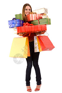 美丽的购物女人带着五颜六色的袋子图片