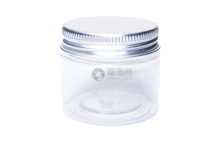 一个单透明塑料罐金属盖的塑料罐头在白图片