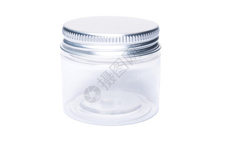 一个单透明塑料罐金属盖的塑料罐头在白图片