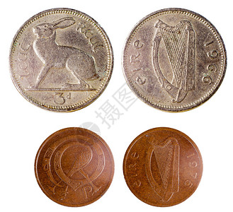 两枚古老的稀有爱尔兰硬币在白色图片