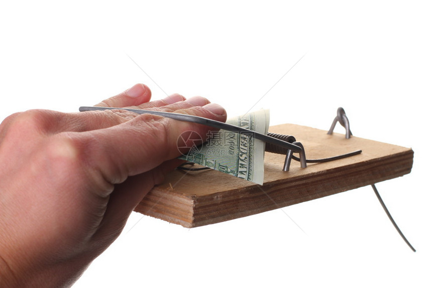 在白背景商业风险商人从捕鼠陷阱中拿钱图片