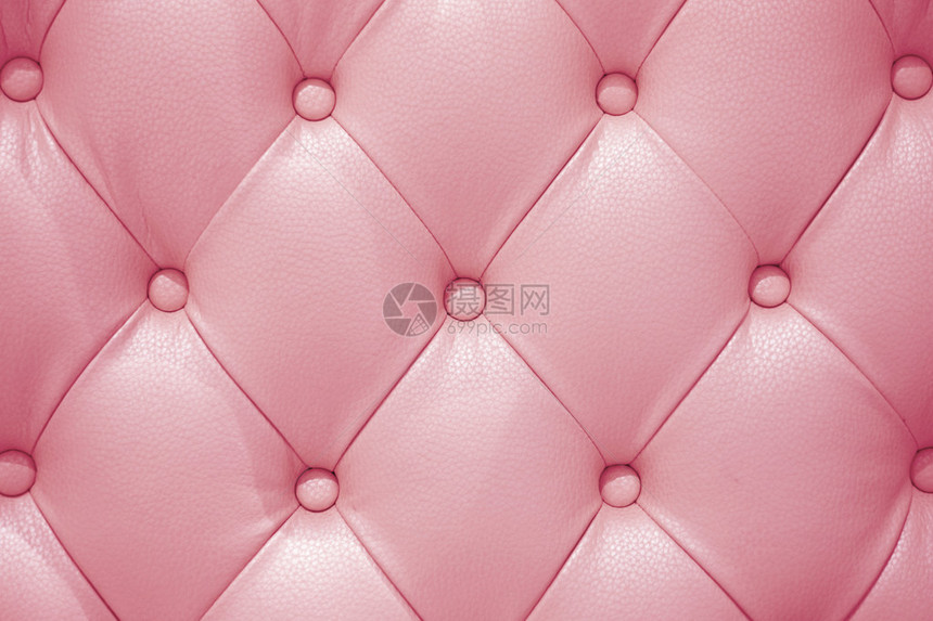 以粉色真皮沙发质感为背景图片