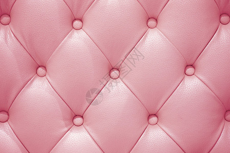 以粉色真皮沙发质感为背景背景图片