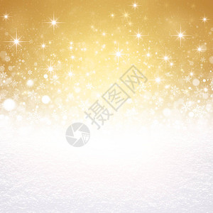 金色背景上的白色雪花和柔的灯光图片