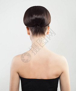 女背部和Updo头发图片
