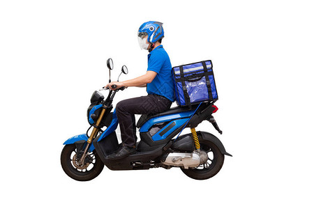 穿着蓝色制服骑摩托车和送货箱的送货员摩托车提供食品或包裹快递服务隔图片