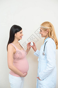产科妇产科妇产科医生和孕妇背景图片