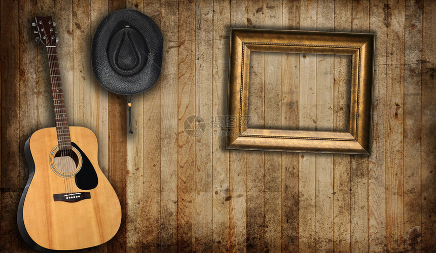 牛仔帽吉他和空的图片框图片