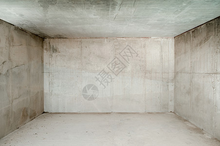 有混凝土墙和地板的空房间图片