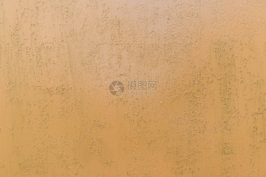 粗糙划伤的橙色墙壁纹理背景图片