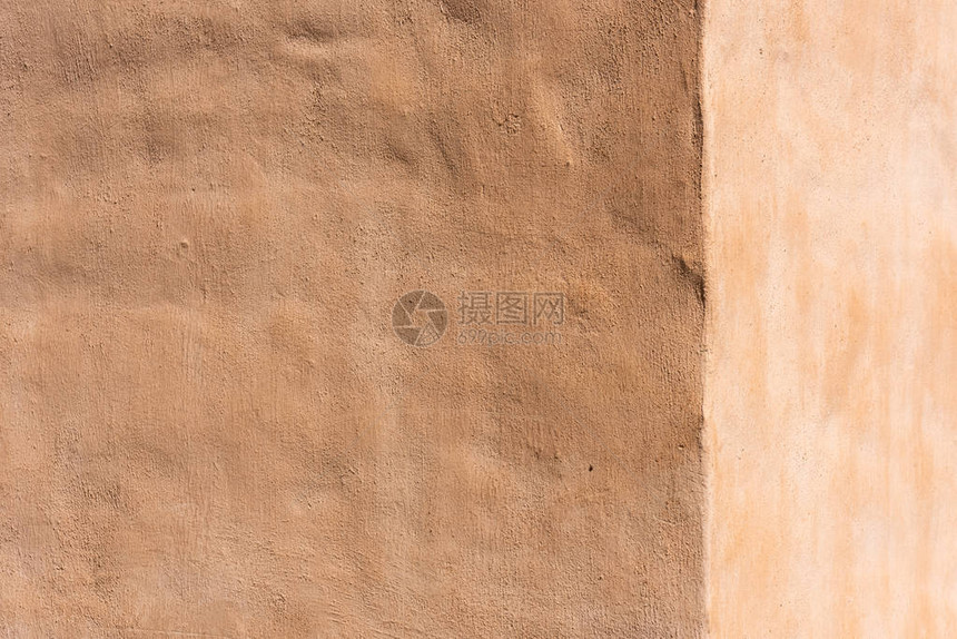 空的浅棕色水泥墙背景图片
