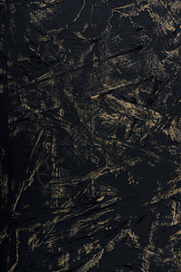 黑色又脏臭的纹理抽象背景的特写视图背景图片