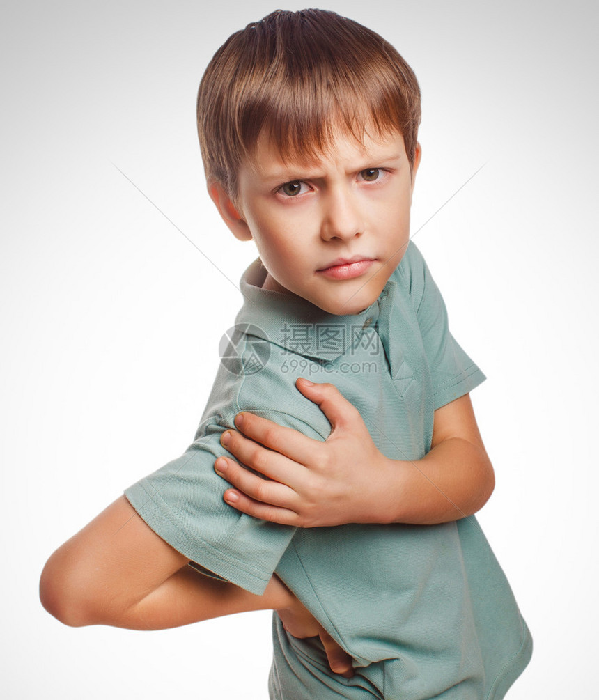 Osteochondrosis小孩十几岁的男孩Isoltad将他的手放在背后部疼痛图片