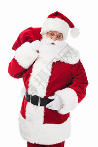 戴帽子眼镜和服装的圣诞老人拿着礼物包背景图片