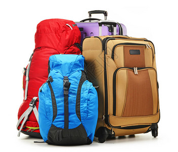 行李包括大型手提箱和在白色图片