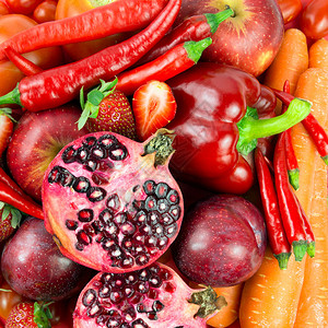 关闭红蔬菜和水果形成背景的红图片