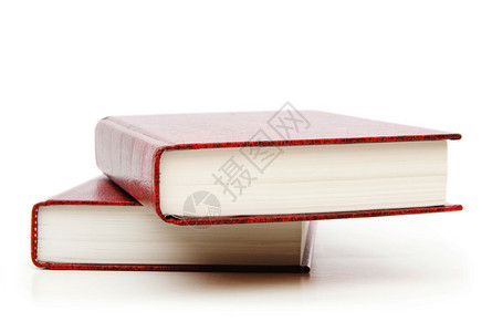 叠着两本书孤立在白色背景上的皮装书背景
