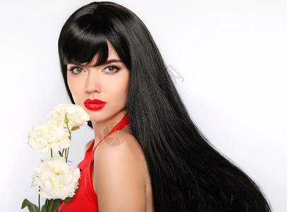 头发美丽的黑发女孩化妆品健康的长发有白花的美女图片