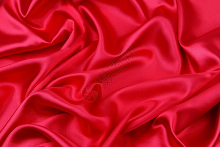 红色丝绸上的涟漪特写图片