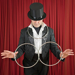 魔术师与连接的金属环图片