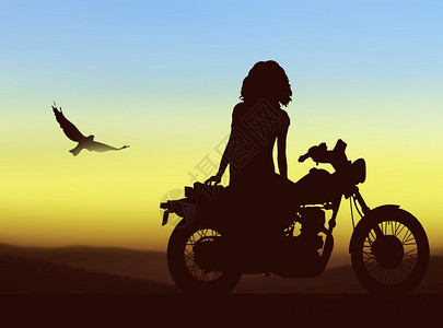 骑自行车的女孩的剪影背景图片