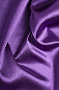 紫色丝绸质感布背景特写图片