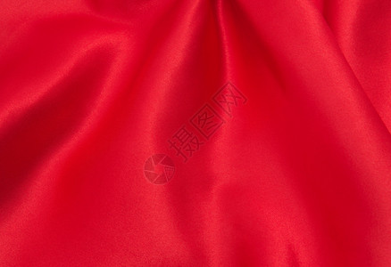 作为背景的红色缎子或丝绸织物背景图片