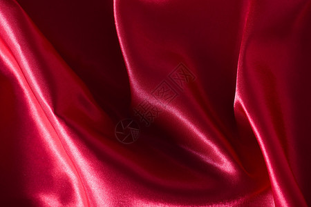 从美丽的红色缎织物背景图片