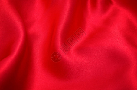 作为背景的红色缎子或丝绸织物背景图片
