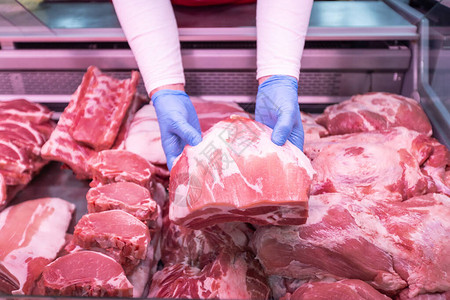 在超市展出新鲜肉品时提供鲜肉将肉背景图片