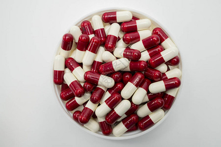 红色白色胶片药丸的顶部视图图片