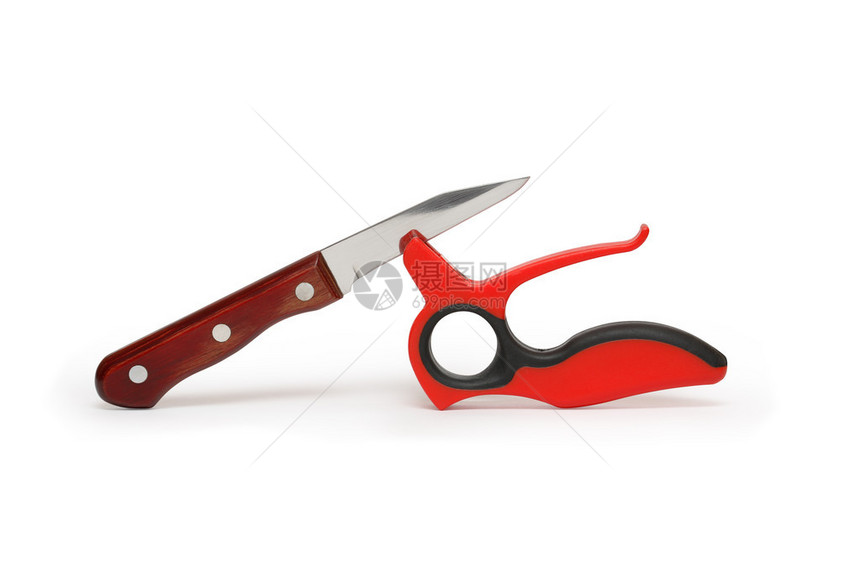 红色塑料刀磨和厨房刀图片