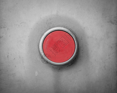一个空白红色工业按钮的复古过滤图像图片