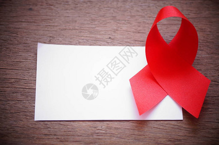 艾滋病红丝带和白纸换字帮助和保护白纸图片