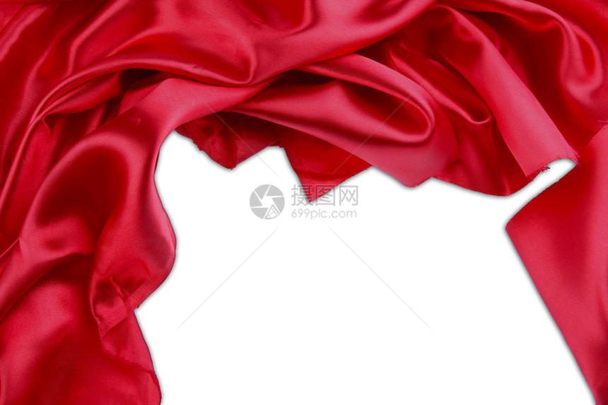 平面背景的红丝织物中的折叠关闭图片