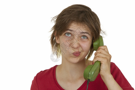 在电话上强调压力的年轻妇女孤图片