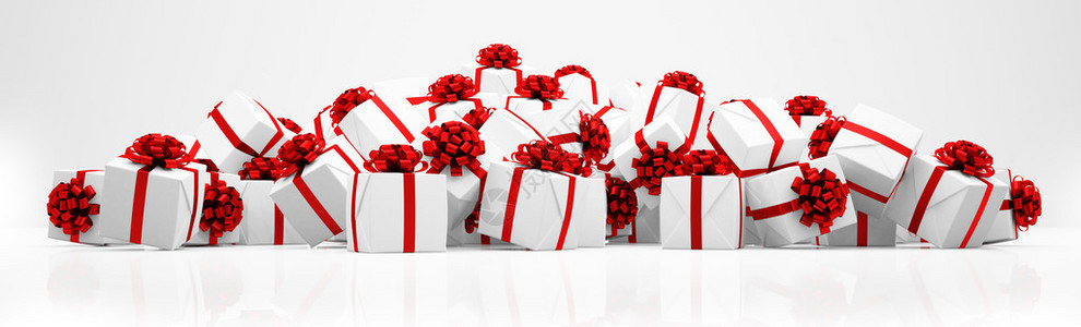 白色圣诞礼物盒上面有白色背景的红丝带图片