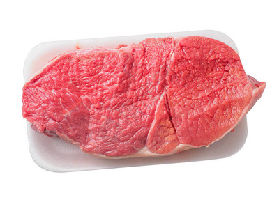 盘子上的生牛肉臀部背景图片