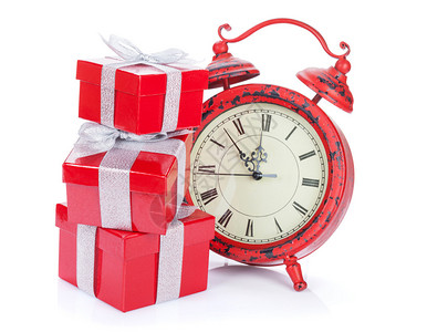 圣诞节时钟和三个礼物盒白图片