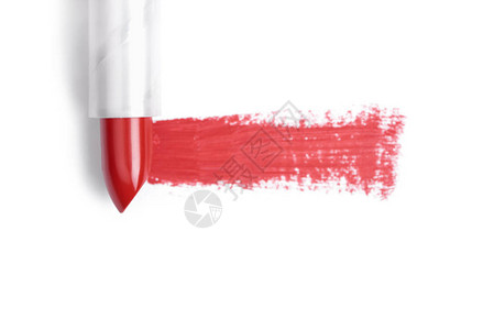 白色背景上红色唇膏笔画的顶部视图图片
