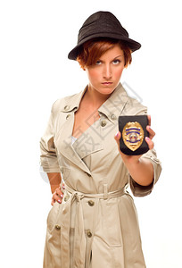 女侦探与官方徽章在TrenchCoatIl孤图片