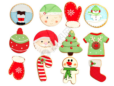 圣诞的一套红滑稽饼干在白色背景图片