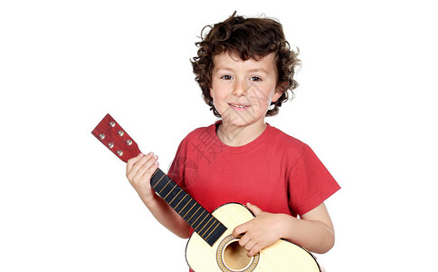 可爱的孩子在白色背景下弹吉他图片