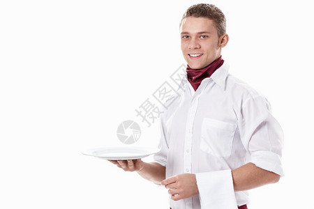 有魅力的年轻服务生拿着白色背景图片