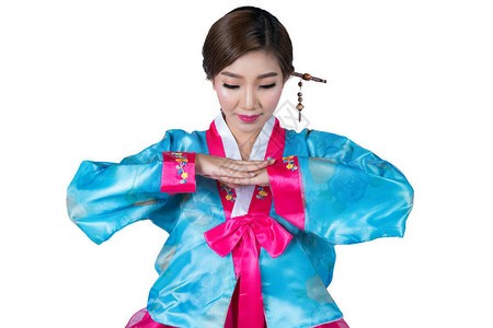 喜悦动作中的韩国女士和朝鲜原有服装图片