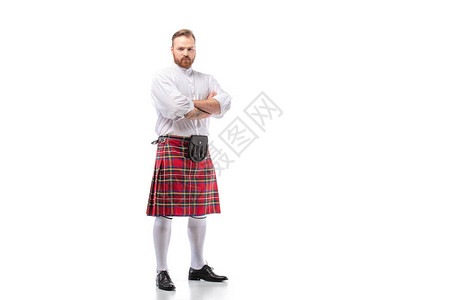 身穿红色大的苏格兰红头胡子男手持白图片