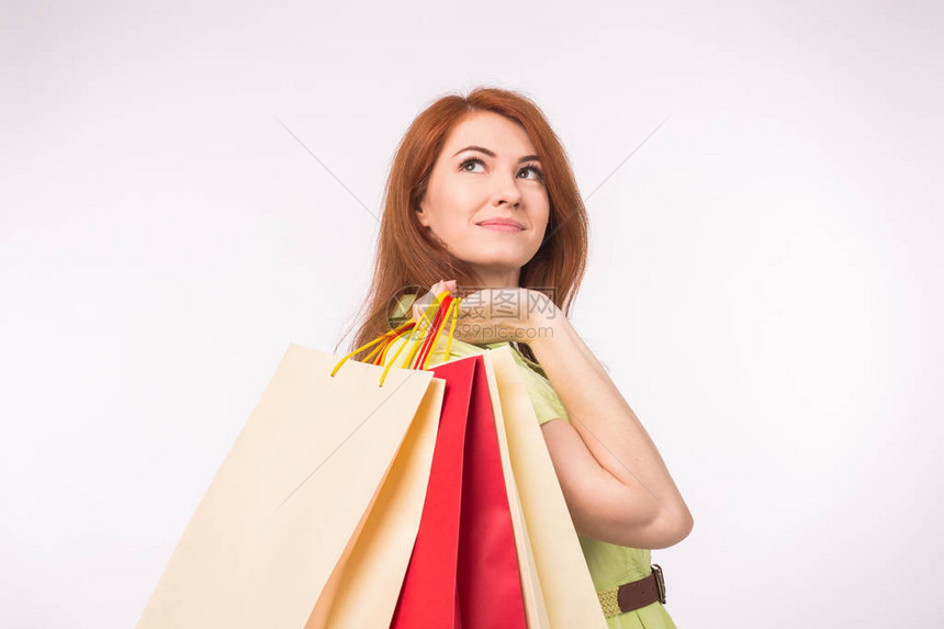 消费者销售和人的概念持有购物袋的图片