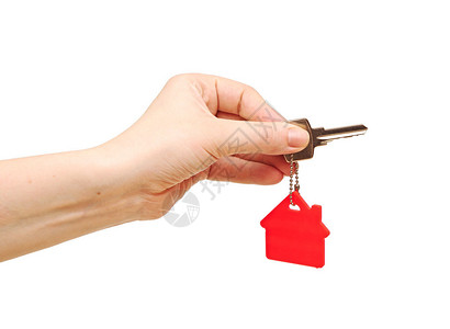 手持钥匙和锁链在房子的形状中房屋钥匙图片