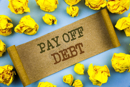 为定居而来文字文字还清债务提醒支付欠款金融信用贷款票据的商业概念以折叠纸为背景